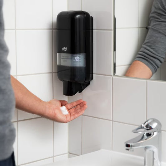 564508-Tork Soap and Sanitiser Dispenser Black S4 wall mounted push button dispenser with refill window